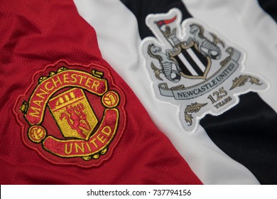 BANGKOK, THAILAND -OCTOBER 19: The Logos Of Manchester United  And Newcastle United Football Club On An Official Jersey On October 19,2017