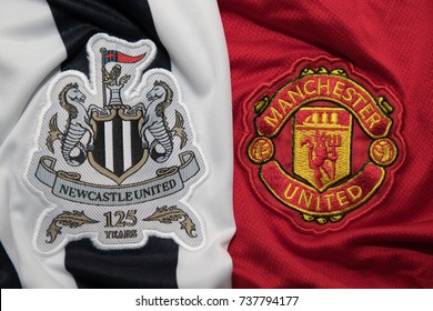 BANGKOK, THAILAND -OCTOBER 19: The Logos Of Newcastle United And Manchester United Football Club On An Official Jersey On October 19,2017