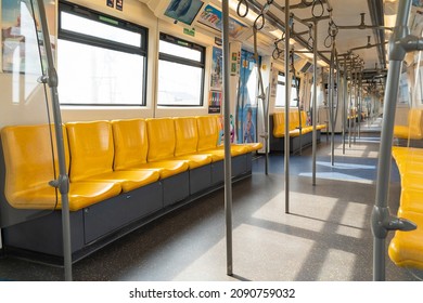 Bangkok, Thailand -‎20 October 2020,  Empty car of Bangkok BTS Skytrain, View of the bright empty interior of the modern  train, clean, architecture,  Yellow seat