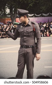 Bangkok, Thailand - October 22, 2016: Thai traffic police officer on duty outside the Grand Palace road Bangkok,Thailand.