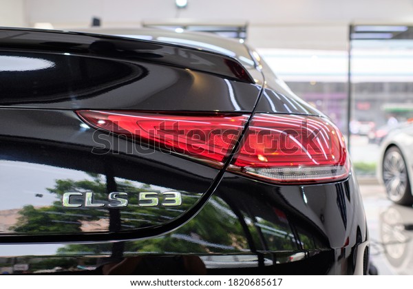 BANGKOK, THAILAND - OCTOBER 22, 2020: Mercedes\
Benz CLS 53 rear view with logo detail. Sports performance car with\
shiny black paint. BMW is German car manufacturer. Concept of car\
brand & company.