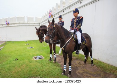 BANGKOK THAILAND OCTOBER 3- Royal Thai army soldier stand by on horse back in front of  grand palace (wat prakaew) important destination landmark on october3,2015 in bangkok thailand