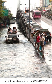 Bangkok, Thailand - OCTOBER 30: Heavy flooding from monsoon rain arriving in Bangkok suburbs on October 30, 2011 in Bangkok, Thailand.