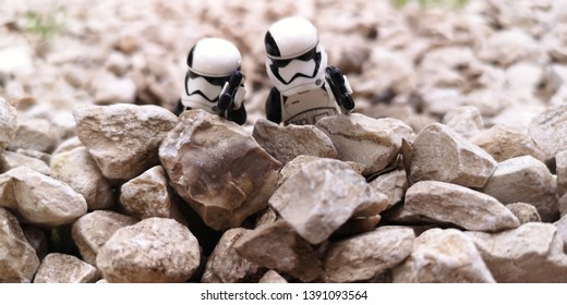 Bangkok Thailand on May 07, 2019: Stormtroopers minifigures were hiding behind stones 