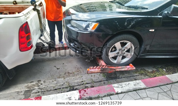 Bangkok Thailand on May 12, 2018: a car was towed\
due to the engine can not\
start