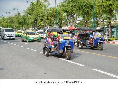 Bangkok, Thailand - Otober 31, 2020: Tricycle or Cycle Rickshaw or Samlor (Thai) or Tuk Tuk (Thai) is an open air traditional taxi that easy to find in every downtown.