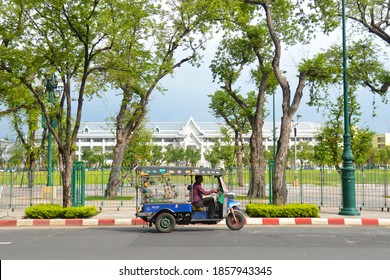 Bangkok, Thailand - Otober 31, 2020: Tricycle or Cycle Rickshaw or Samlor (Thai) or Tuk Tuk (Thai) is an open air traditional taxi that easy to find in every downtown.