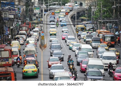 BANGKOK, THAILAND - SEP 29, 2013: Traffic reaches gridlock on a busy city centre road. Each year an estimated 150,000 cars join the heavily congested streets of the Thai capital.