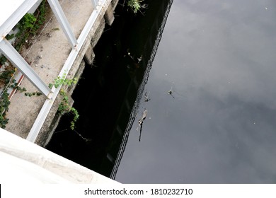 Bangkok, Thailand - Sep 7,2020 : Polluted Black Dirty Wastewater Canal In City Community Of Bangkok.