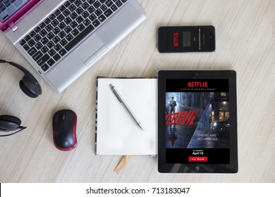 BANGKOK ,THAILAND - September 07, 2017 : Netflix App On Apple IPad And Netflix Login Screen On IPhone 6.  Netflix Is An International Leading Subscription Service For Watching TV Episodes And Movies.