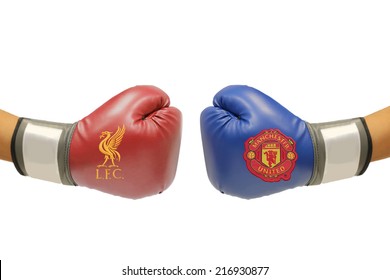 BANGKOK, THAILAND - SEPTEMBER 13, 2014: The Logo Of Liverpool And Manchester United Football Club On The Boxing Glove On The On  13 September 2014 In Bangkok Thailand.