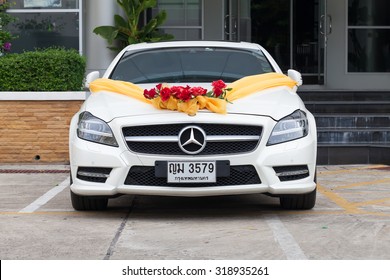 Bangkok, Thailand - September 21, 2015: Mercedes Benz wedding car with decorations in the parking.