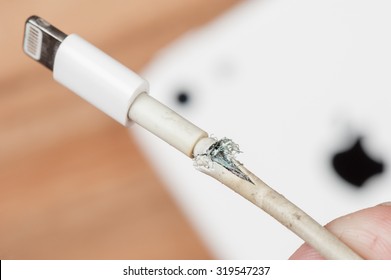 BANGKOK, THAILAND - SEPTEMBER 23, 2015: The Broken IPhone Charger Cable.