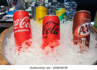 Bangkok, Thailand – September 6, 2022: Many Of Non Alcoholic Beverage Soft Drink Tin Can Brand In Ice Cube Bucket. Concept Of Refresh, Fresh, Marketing.