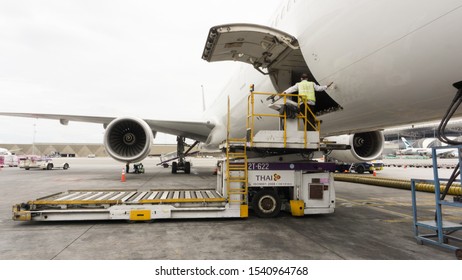 Bangkok, Thailand - September 8, 2019 : Thaiairways Staff Opening Airplane Cargo Door Preparing For Load Cargo, Conveyance Truck, Ground Services, Loading Platform.