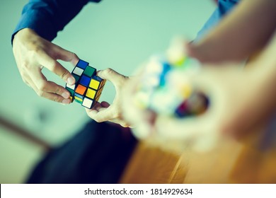 Bangkok, Thailand - September 9, 2020 : Business man holding Rubik's cube - technical and business solving problem and brain training concept - Shutterstock ID 1814929634