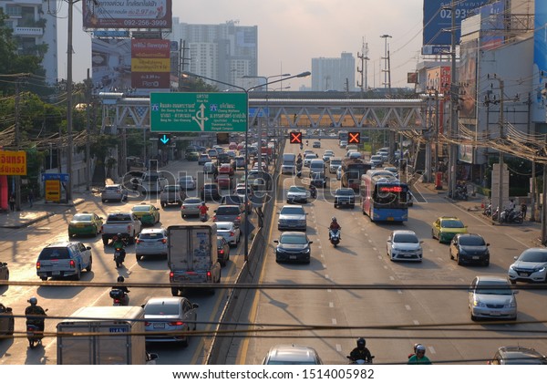 Bangkok Thailand Southeast Asia September 25 2019\
traffic road in downtown there were a lot of cars and commercial\
sign posted in the evening\
