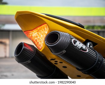 Bangkok, Thailand-05-30-2021: Motorcycle Yellow-Black Yamaha YZF R1, Part No. Yam-YZF1000, Exhaust Pipe On Black