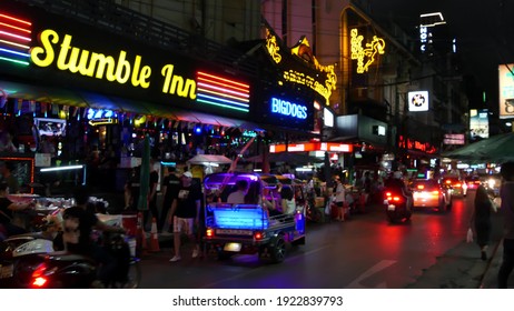 BANGKOK, THAILAND,13 JULY 2019 Vivid Neon Signs Glowing, Nana Plaza Street. Nightlife In Erotic Red Light District Soi. Illuminated Bar And Adult Go-go Show Club. Night Life Tourist Entertainment