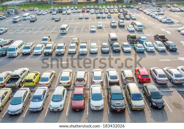 BANGKOK,\
THAILAND-FEB 07, 2014 : Aerial view of airport car crowded parking\
lot in Suvarnabhumi Airport in Bangkok ,Thailand.This airport is\
handling about 45 million passengers\
annually.