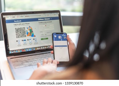 BANGKOK, THAILAND-February 26, 2019: Facebook Social Media App Icon Signup Page On Iphone X Mobile Smartphone Device And Computer Laptop For User FB Live Public Communication Network.