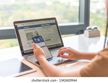 BANGKOK, THAILAND-February 26, 2019: Facebook Social Media App Icon Signup Page On Iphone X Mobile Smartphone Device And Computer Laptop For User FB Live Public Communication Network.