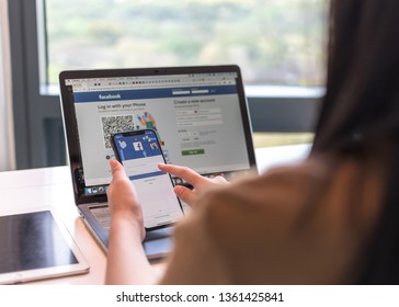 BANGKOK, THAILAND-February 26, 2019: Facebook Social Media App Icon Signup Page On Iphone X Mobile Smartphone Device And Computer Laptop For User FB Live Public Communication Network.