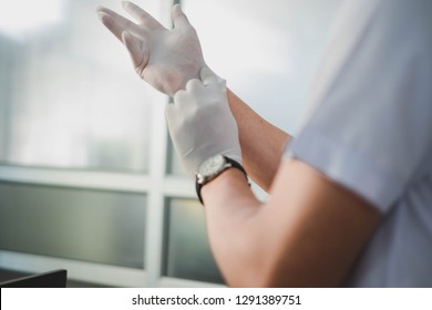 Bangkok, Thailand-January 19, 2019: Doctor Holding Stethoscope While Looking At Watch. Selective Focus. This Picture Can Be Used In Such Concepts As Med Student, Doctor, Hospital, Clinic And So On.  