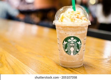 Bangkok ,Thailand-July 15 : Glass Of Starbuck Coffee Frappuccino Blended Beverages Served At Wood Table In Starbuck Shop At Seacon Department Store, Bangkok, Thailand.