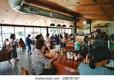 Bangkok, Thailand:May 12,2018-Crowded Customers Are Waiting For The Order At Starbucks Coffee. Lifestyle Of People In The Weekend. Coffee And Bakery Shop Concept.