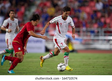 BANGKOK THAILAND-NOVEMBER 15:Masoud Shojaei #7(white)of Iran Control The Ball During The 2015 AFC Asian Cup Qualifiers Between Thailand And Iran At Rajamangala Stadium On Nov15, 2013 In Thailand.