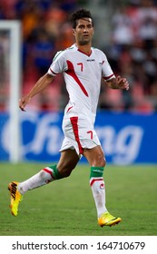 BANGKOK THAILAND-NOVEMBER 15:Masoud Shojaei (white)of Iran Run During The 2015 AFC Asian Cup Qualifiers Between Thailand And Iran At Rajamangala Stadium On Nov15, 2013 In Thailand.