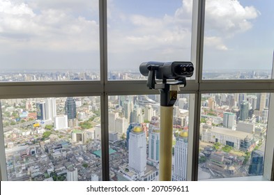 bangkok view and telescope from Baiyoke Tower II on 3 July 2014 BANGKOK - July 3: Baiyoke Tower II is the tallest building in Thailand with 328.4 m. july 3, 2014 in Bangkok, Thailand