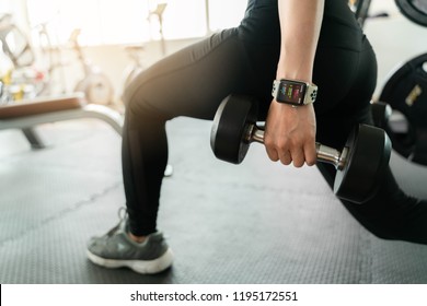 Bangkok,Thailand ,1 Oct 2018 : Close Up Of Apple Watch Activity Screen Young Woman Dumbbell Workout Fitness Gym