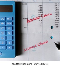 Bangkok,Thailand -10Sep2021-Blue Calculator , Pen, Bank Pass Book With Stamp ACCOUNT CLOSED, Means Bank Account Was Terminated Or Deactivated ,withdraw To Zero Balance Left, Unable To Do Transaction