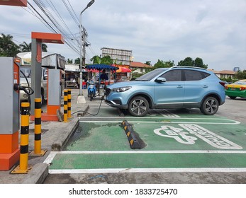 Bangkok,Thailand 13 Oct 2020:Photo Of An Electric Car MG ZS EV Blue Parked Charger Of The Metropolitan Electricity Authority At The Charging Station Without Charge, Electric Charging Service For Free