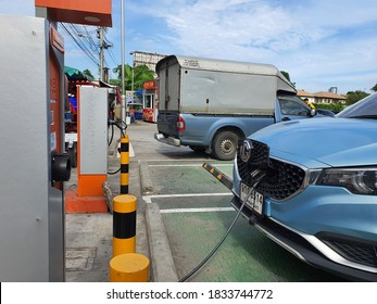 Bangkok,Thailand 13 Oct 2020:Photo Of An Electric Car MG ZS EV Blue Parked Charger Of The Metropolitan Electricity Authority At The Charging Station Without Charge, Electric Charging Service For Free