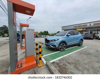 Bangkok,Thailand 13 Oct 2020:Photo Of An Electric Car MG ZS EV Blue Parked Charger Of The Metropolitan Electricity Authority At The Charging Station Without Charge, Electric Charging Service For Free