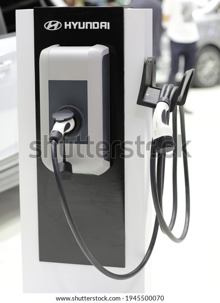 Bangkok,Thailand\
27March 2021:Close-up electric car charging.Use for website,\
banner, background and backdrop. \
