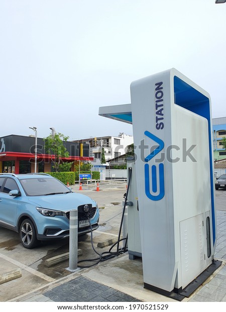 Bangkok,Thailand\
6May 2021:The power station is connected to the electric vehicle to\
charge the battery.  Transportation in the charging technology\
industry that is the future of\
cars.
