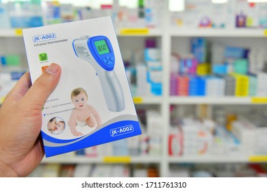 Bangkok,Thailand - April 3, 2020 :Customers Are Choosing To Buy Infrared Medical Thermometer Gun In Pharmacy Store