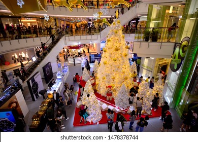 BANGKOK/THAILAND - DEC 27: Gold and White Christmas Tree inside the Christmas Festival at CentralWorld Mega-shopping Complex in Thailand, on December 27, 2016 in Ratchaprasong, Bangkok, Thailand