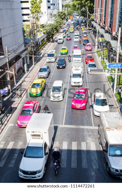 Bangkok/Thailand - December 25, 2014:
A busy intersection filled with traffic in Bangkok,
Thailand.
