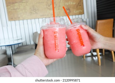 BANGKOK,THAILAND - JANUARY 20,2022 : Strawberry Smoothie At Dunkin' Donuts Shop , Dunkin' Donuts Is An American Global Doughnut Company And Coffeehouse Chain.