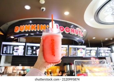 BANGKOK,THAILAND - JANUARY 20,2022 : Strawberry Smoothie At Dunkin' Donuts Shop , Dunkin' Donuts Is An American Global Doughnut Company And Coffeehouse Chain.