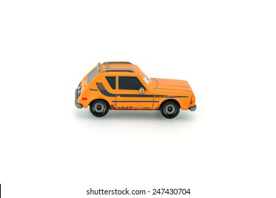 Bangkok,Thailand - January 26, 2015: Grem Rusty Orange AMC Gremlin A Main Protagonist Of The Disney Pixar Feature Film Cars. A Diecast Cars Collection From Mattel Inc.