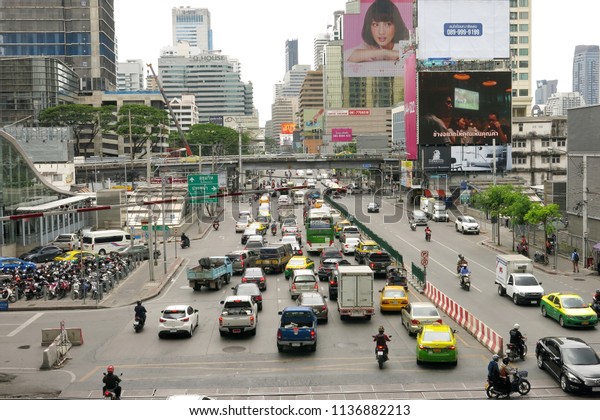 Bangkok,Thailand - July 2018 : traffic on the\
main road near airport rail link station during working hours in\
the afternoon