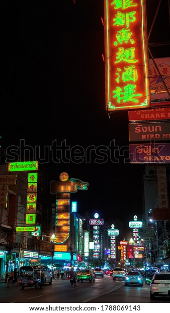 Bangkok,Thailand - July 31,2020 : Cars and\
shops on Yaowarat road , the main street of China\
town.