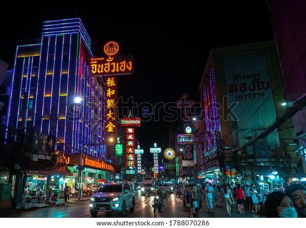Bangkok,Thailand - July 31,2020 : Cars and
shops on Yaowarat road , the main street of China
town.