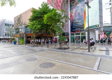 Bangkok,Thailand - July 7,2022 : People Cross Crosswalk Near Digital Gateway At Siam Square In Bangkok, Thailand. 